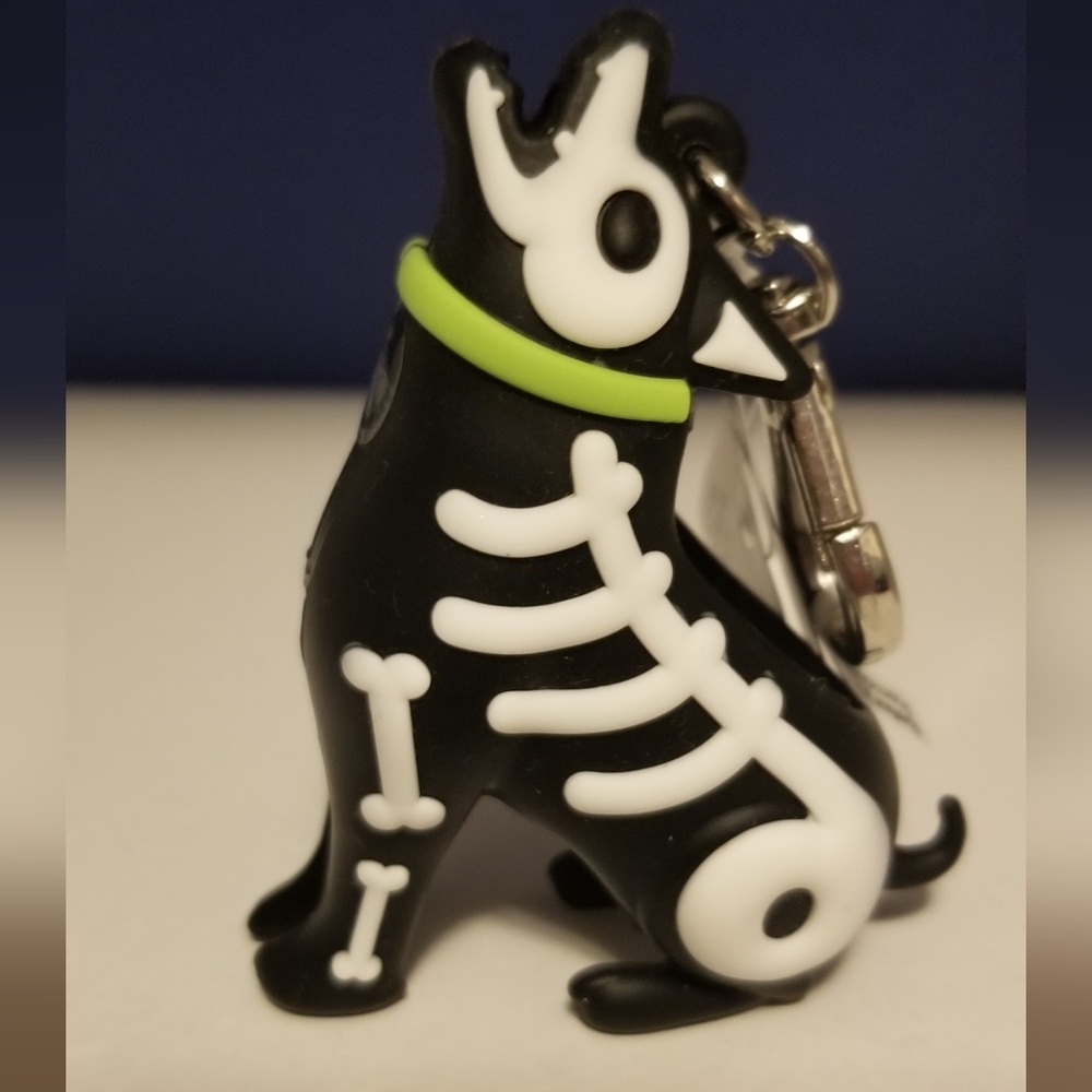 SOLD!!!  Rare Bath & Body Works GITD Howling Skeleton Dog Pocketbac Holder